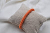 Kknekki Haargummi faded orange